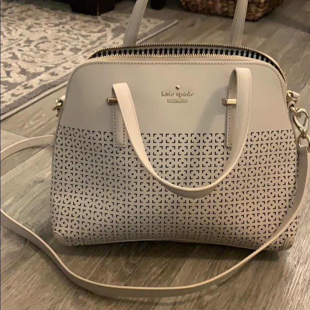 Medium size Kate spade cutout crossbody purse